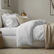 White Linen Fitted Sheet On Bed