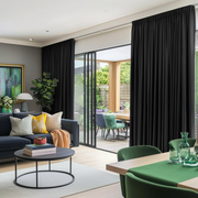 Black Linen Pencil Pleat Curtains for Sliding Doors in a Living Room with Grey Walls - Blackout Lining
@Heading: Pencil Pleat