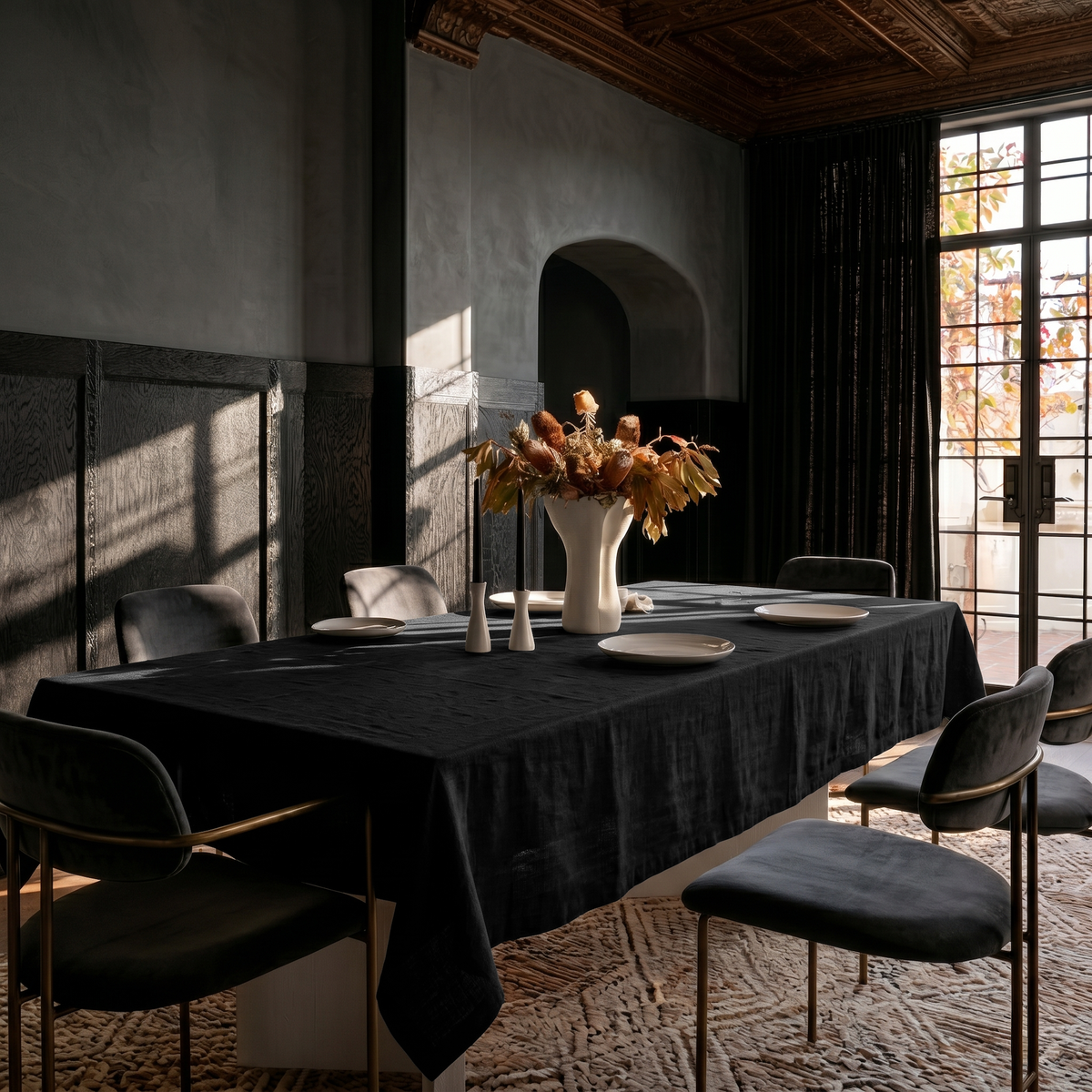 Black Rectangular Linen Tablecloth in a Dramatic Contemporary Dining Room with Ornate Ceiling
