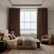 Chocolate Brown Velvet Back Tab Blackout Curtains in a Bedroom with Beige Walls