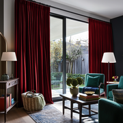 Dark Deep Red Velvet Pencil Pleat Blackout Curtains for Sliding Doors in a Living Room with Charcoal Walls