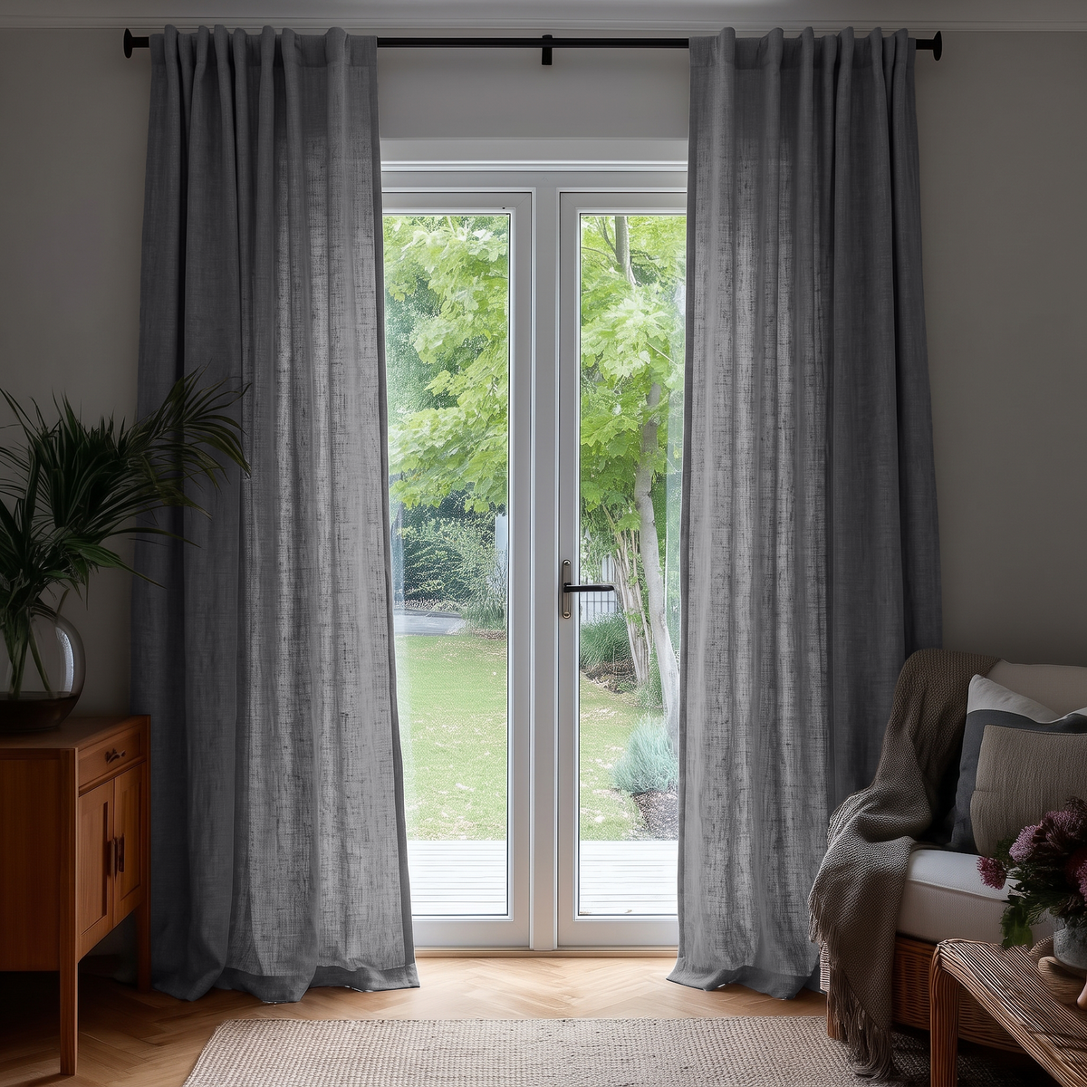 Dim Grey Back Tab Extra Long Curtains in a Contemporary Living Room with a Garden View and Warm Ambient Lighting