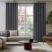 Dim Grey Linen Grommet Extra Long Curtains in a Modern Living Room with a Garden View and Neutral Upholstery
