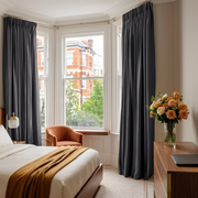 Dim Grey Linen Pencil Pleat Curtains in a Bright White Bedroom with Warm Leather Accents - Blackout Lining