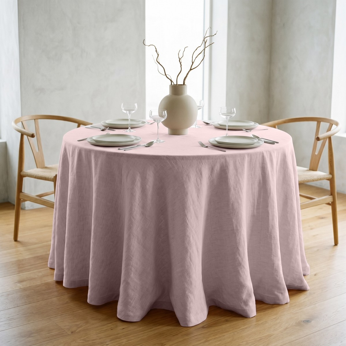 Dusty Pink Linen 120 Inch Round Tablecloth in a Minimal Dining Room with White Plaster Walls and Light Wood