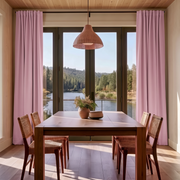 Dusty Rose Linen Back Tabs Dining Room Curtain in a Rustic Dining Room with Wood Paneled Walls, Woven Dining Chairs and a Scenic Lake View - Blackout Lining