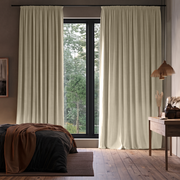 Ecru Heavy Weight Linen Pencil Pleat Extra Long Curtains in a Contemporary Bedroom with Dark Bedding and Black-Framed Windows
