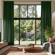Forest Green Linen S-Fold Extra Long Curtains in a Modern Living Room with a Wooden Coffee Table, a Gray Sofa, and a Textured Brown Rug