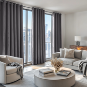 Grey Velvet Grommet Blackout Curtains in a Living Room with White Walls