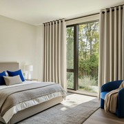 Ecru Heavy Weight Linen Grommet Curtains in a Bright Bedroom With Blue Accents - Blackout Lining