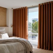 Terracotta Heavy Weight Linen Grommet Curtains in a Bright Neutral Bedroom With Warm White Walls - Blackout Lining