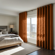 Terracotta Heavy Weight Linen Grommet Curtains in a Cozy Modern Bedroom With Soft Greige Walls and Dark Wood Furniture