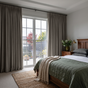 Natural Heavy Weight Linen Pencil Pleat Bedroom Curtains in a Bright Neutral Bedroom with Olive Green Accents