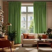 Light Green Velvet Pinch Pleat Blackout Curtains in a Living Room with Beige Walls