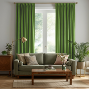 Light Green Velvet Pinch Pleat Blackout Curtains in a Living Room with Pale Grey Walls