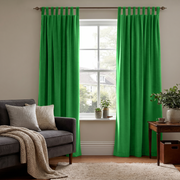 Lime Green Velvet Tab Top Curtains in a Cozy Living Room with Beige Walls and a Charcoal Sofa