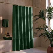 Linen Forest Green Button-Hole Top Shower Curtain in a Contemporary Bathroom with Beige Marble Walls