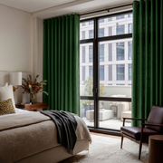 Forest Green Linen Grommet Bedroom Curtains in a Contemporary Bedroom with Dark Leather Accent Chair and Charcoal Accents - Blackout Lining