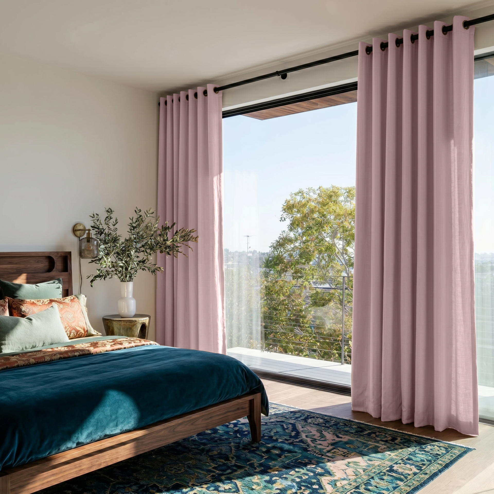 Dusty Pink Linen Grommet Bedroom Curtains in a Bright Contemporary Bedroom with Deep Teal Bedding and Patterned Accent Pillows