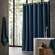 Peacock Blue Linen Hookless Weighted Shower Curtain in a Modern Bright Bathroom Space