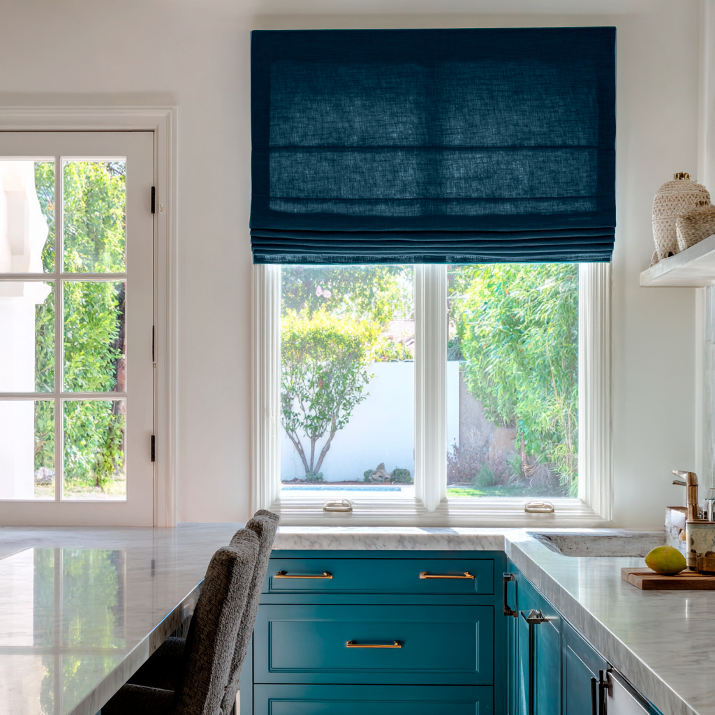 Peacock Blue Linen Roman Shades in a Bright Modern Kitchen with White Walls
