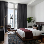 Dim Grey Linen Pencil Pleat Curtains in a Modern White Bedroom with Dark Wood Furniture
