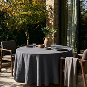 Dim Grey Linen Round Tablecloth in a Shaded Patio Dining Space