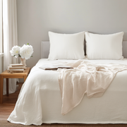 Off-White Linen Sheet Set on Bed