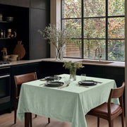 Mint Green Square Velvet Tablecloth in a Contemporary Kitchen with Black Cabinetry