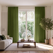 Moss Green Linen Pencil Pleat Extra Long Curtains in a Modern Living Room with White Sofa and Large Garden Windows