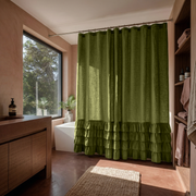 Moss Green Linen Ruffle Shower Curtain in a Modern Bathroom with Soft Terracotta-Plaster Walls and Blush Accents
