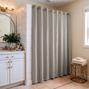 Natural Linen Hookless Shower Curtain in a Contemporary Bathroom with Warm Beige Walls and White Vanity
