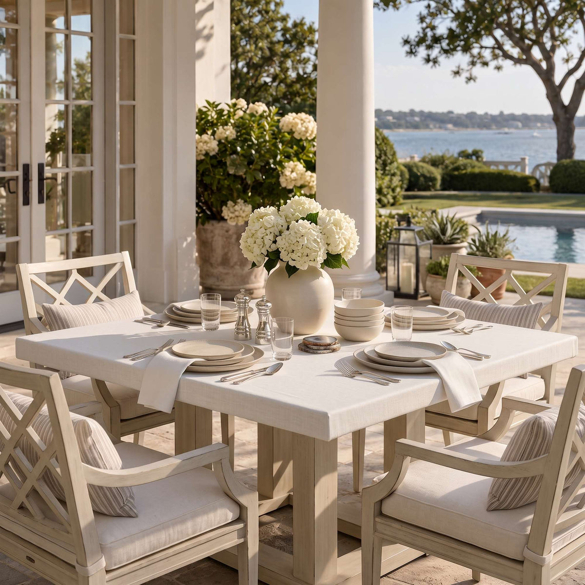 Off-White Fitted Square Linen Tablecloth in a Coastal Patio Dining Area
