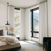 Off-White Heavy Weight Linen Grommet Curtains in a Bright Modern Bedroom With White and Beige Bedding and Black Accents - Blackout Lining