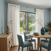 Off-White Linen Pinch Pleat Curtains for Sliding Doors in a Dining Room with Light Blue Walls - Cotton Lining
@Heading: Pinch Pleat