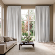 Off-White Velvet Pencil Pleat Extra Long Curtains in a Bright, Modern Living Room With a Beige Sofa and Wooden Coffee Table