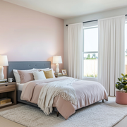 Off-White Velvet Rod Pocket Blackout Curtains in a Bedroom with Blush Pink Walls