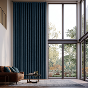 Peacock Blue Linen S-Fold Extra Long Curtains in a Contemporary Living Room with Floor-to-Ceiling Windows and Garden View