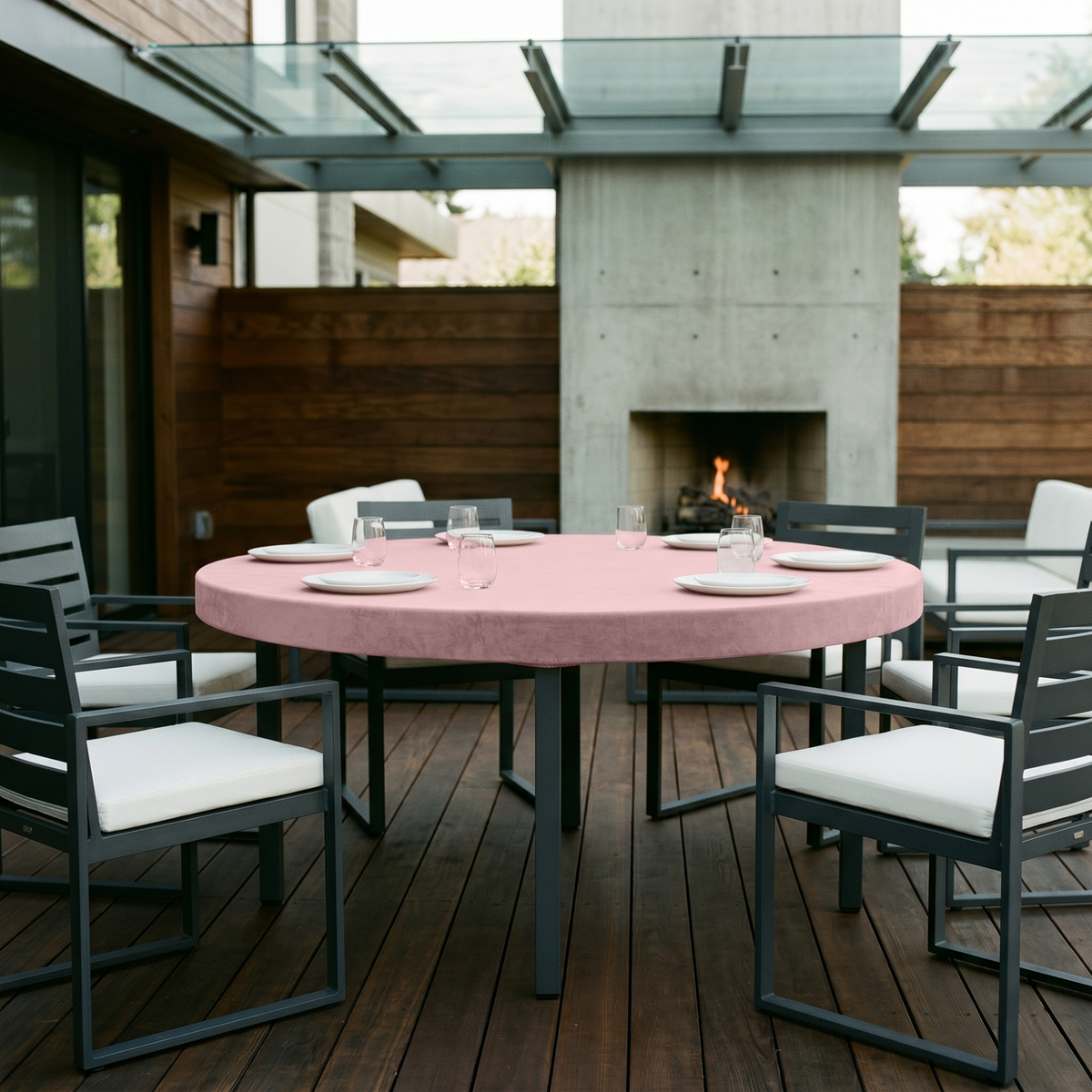 Pink Fitted Velvet Round Tablecloth in a Modern Patio Dining Space with Gray Metal Chairs and Dark Wood Accents