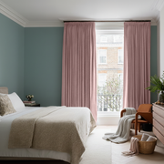 Pink Velvet Pencil Pleat Blackout Curtains in a Bedroom with Teal Walls