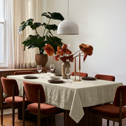 Ecru Rectangular Heavy Weight Linen Tablecloth in a Mid-Century Modern Dining Room with Rust Velvet Chairs