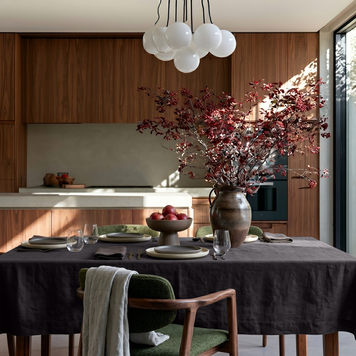 Charcoal Grey Rectangular Linen Tablecloth in a Contemporary Kitchen Dining Area with Walnut Cabinetry