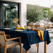 Peacock Blue Rectangular Linen Tablecloth on a Contemporary Outdoor Patio with Lounge Seating