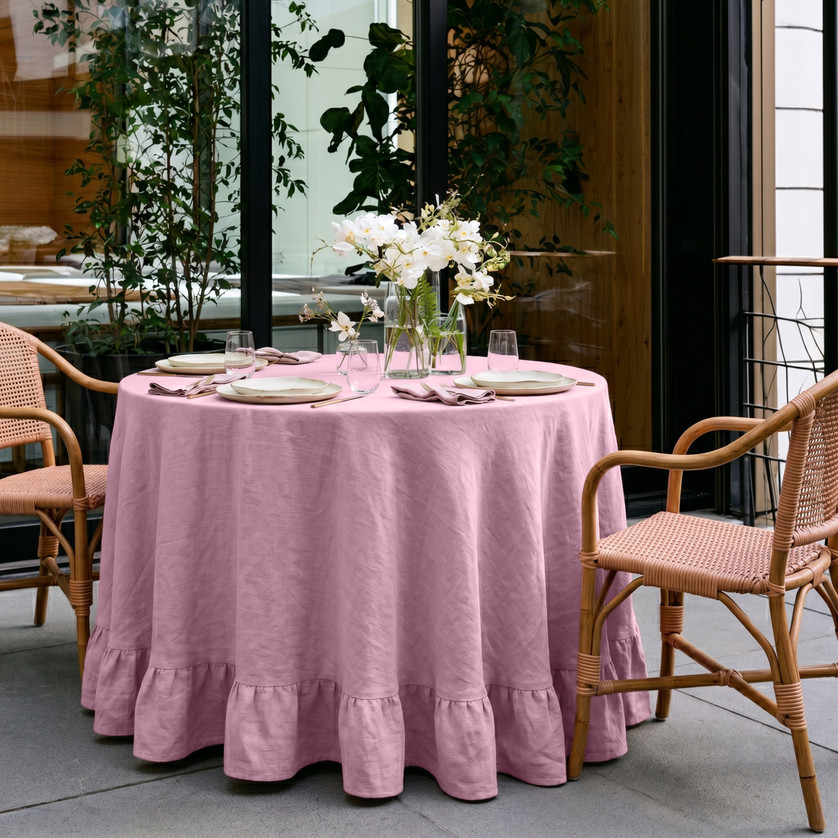 Dusty Rose Linen Round Ruffle Tablecloth in an Outdoor Patio Dining Space