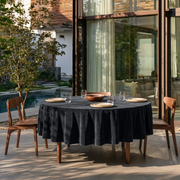 Steel Black Round Velvet Tablecloth in an Outdoor Patio