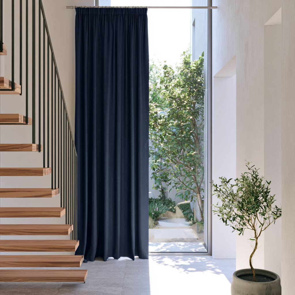 Royal Blue Linen Pencil Pleat Extra Long Curtains in a Minimalist Hallway with Wooden Staircase and Tall Window