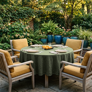Sage Green Linen 72 Inch Round Tablecloth in a Garden Patio Dining Space with Mustard Cushions