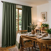 Sage Green Linen Back Tab Curtains in a Cozy Cottage Dining Room with Wooden Furniture and Garden Views