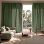 Sage Green Linen Pencil Pleat Extra Long Curtains in a Transitional Living Room with Neutral Sofa and Garden Patio View