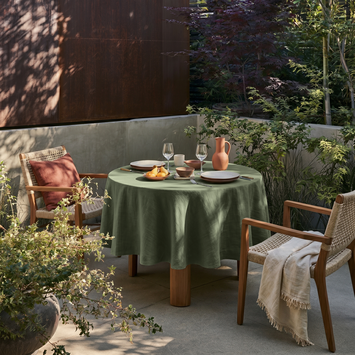 Sage Green Linen Round Tablecloth in a Garden Patio Dining Space